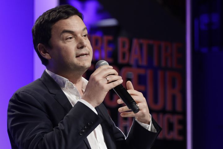 Thomas Piketty, le 21 mars 2017, lors d'un meeting de Benoît Hamon à Bruxelles. (THIERRY ROGE / BELGA MAG / AFP)