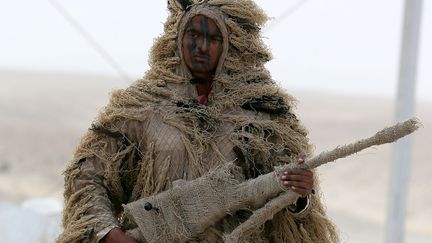 Un soldat qatari en tenue de camouflage &agrave; Doha (Qatar), le 7 mars 2013. (AL-WATAN / AFP)