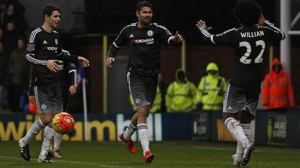 Les Blues Willian, Oscar et Diego Costa, premiers buteurs de l'année 2016 pour Chelsea (ADRIAN DENNIS / AFP)