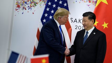 Donald Trump et Xi Jinping, lors d'une réunion en marge du sommet du G20, à Osaka (Japon), le 29 juin 2019.&nbsp; (BRENDAN SMIALOWSKI / AFP)