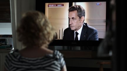 L'ancien pr&eacute;sident de la R&eacute;publique Nicolas Sarkozy intervient sur TF1 et Europe 1 apr&egrave;s sa mise en examen, mercredi 2 juillet 2014. (CHARLY TRIBALLEAU / AFP)