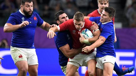 Le Gallois Liam Williams à la lutte avec les Bleus lors du quart de finale du Mondial à Oita, dimanche 20 octobre 2019. (CHRISTOPHE SIMON / AFP)