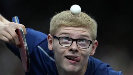 La concentration dans les yeux de Felix Lebrun. Le jeune prodige français du tennis de table est allé décrocher la médaille de bronze en simple (le 4 août) et la même par équipes aux côtés de son frère Alexis et Simon Gauzy (le 9 août). Les deux premières médailles olympiques du ping français depuis 2000. (SIPA)