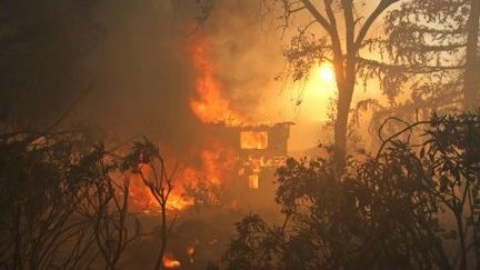 Une maison détruite à San Marcos en Califprnie par des incendies qui ont ravagé 202 hectares. (AFP)