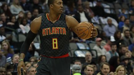 Le pivot Dwight Howard sous le maillot des Hawks d'Atlanta. (RONALD MARTINEZ / GETTY IMAGES NORTH AMERICA)