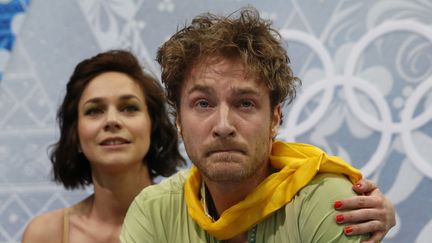 Nathalie P&eacute;chalat et Fabian Bourzat, lundi 17 f&eacute;vrier, apr&egrave;s leur prestation dans le programme libre de danse sur glace, aux Jeux olympiques de Sotchi (Russie). (ADRIAN DENNIS / AFP)