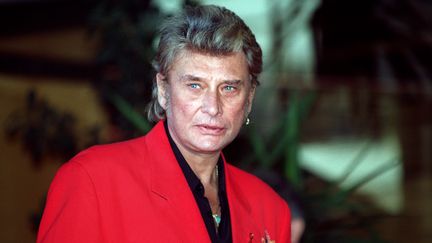 Johnny Hallyday au Midem à Cannes (Alpes-Maritimes), le 31 janvier 1995.&nbsp; (PATRICK HERTZOG / AFP)