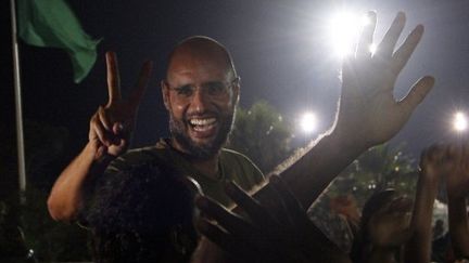 Saif al-Islam Kadhafi devant les journalistes à Tripoli (23 août 2011) (AFP / Imed Lamloum)