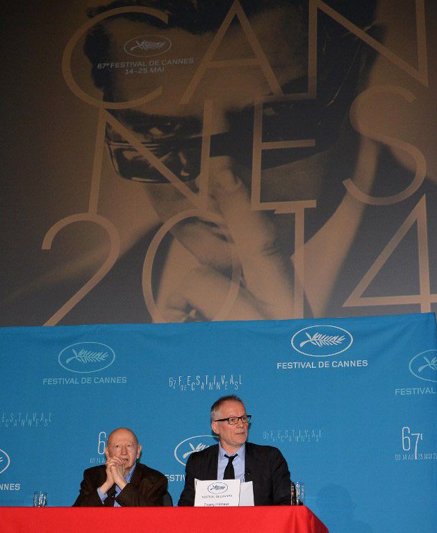 Gilles Jacob, président du Festival de Cannes, et Thierry Frémaux, son délégué général, annoncent la sélection officielle devant l'affiche de la 64e édition, le jeudi 17 avril 2014
 (MUSTAFA YALCIN / ANADOLU AGENCY)