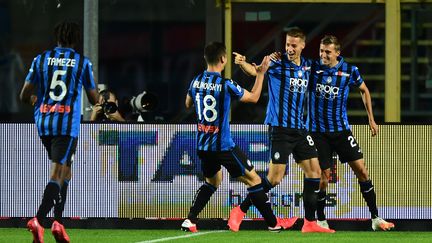 Les joueurs de l'Atalanta Bergame  (MIGUEL MEDINA / AFP)