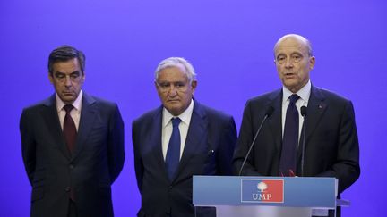 &nbsp; (Les trois dirigeants de l'UMP lors d'un point presse le 8 juillet © MAXPPP)