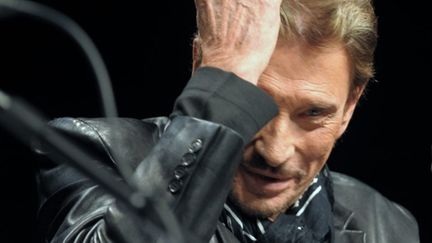 Johnny Hallyday en conférence de presse à saint-Etienne pour annoncer le Tour 66 (6 octobre 2008) (AFP/JEAN-PHILIPPE KSIAZEK)