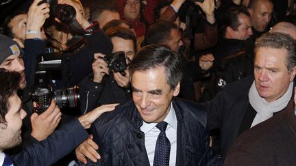 François Fillon, arrivé en tête du premier tour de la primaire à droite arrive à son siège de campagne à Paris dimanche 20 novembre. (GONZALO FUENTES / AFP)