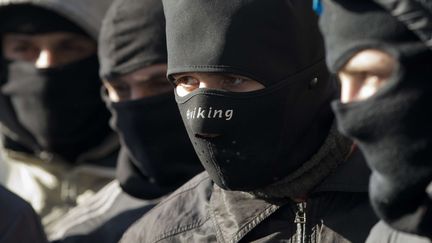 Des membres du groupe nationaliste radical ukrainein&nbsp;Pravy Sektor, le 3 f&eacute;vrier 2014 &agrave; Kiev (Ukraine). (DARKO BANDIC / AP / SIPA)