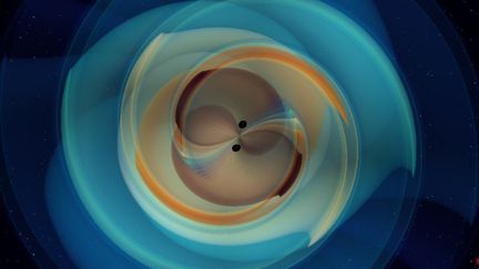 Cette image distribuée par l'Institut Max Planck pour la physique gravitationnelle, le 2 septembre 2020, montre une simulation d'une fusion binaire de trous noirs "GW190521". (N. FISCHER / MAX PLANCK INSTISTUTE FOR GRAVIT / AFP)