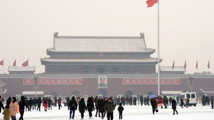 Autre "anomalie" constat&eacute;e : un froid p&ocirc;laire s'est aussi abattu sur la Russie et la Chine. P&eacute;kin exp&eacute;rimente l'une de ses plus longues p&eacute;riodes sous la neige.&nbsp; (GOH CHAI HIN / AFP)