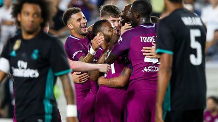 Manchester City a dominé le Real Madrid (4-1) ce mercredi, à Los Angeles.  (RINGO CHIU / AFP)