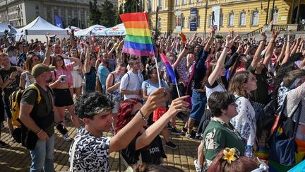 People with a rainbow flag, symbol of the LGBT+ community, in Sofia, Bulgaria, on June 22, 2024. (GEORGI PALEYKOV / AFP)