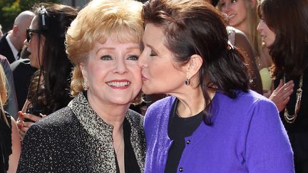 Debbie Reynolds et sa fille Carrie Fisher en 2011
 (Noel Vasquez / GETTY IMAGES NORTH AMERICA / AFP)