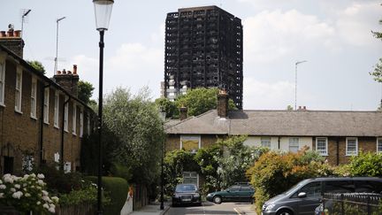 La tour Grenfell, dans le quartier de North Kensington, à Londres, photographiée dimanche 18 juin 2017.&nbsp; (TOLGA AKMEN / AFP)