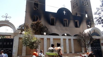 Une &eacute;glise copte br&ucirc;l&eacute;e dans la ville d'Al-Minya (Egypte), au sud du Caire, le 14 ao&ucirc;t 2013. (AFP)