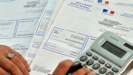 En 2014, l'ex&eacute;cutif a annonc&eacute; une baisse de l'imp&ocirc;t sur le revenu pour 9 millions de foyers, en 2015. (PHILIPPE HUGUEN / AFP)