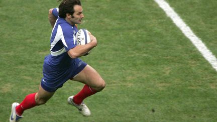 Christophe Dominici avec les Bleus (FRANCOIS GUILLOT / AFP)