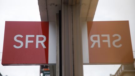 Une enseigne SFR (illustration). (SAMEER AL-DOUMY / AFP)