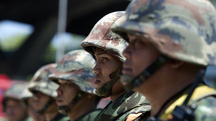 Des soldats tha&iuml;landais, &agrave; Bangkok (Tha&iuml;lande), le 22 mai 2014. (PORNCHAI KITTIWONGSAKUL / AFP)