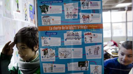 &nbsp; (La charte de la laïcité fait sa rentrée à l'école © Maxppp)