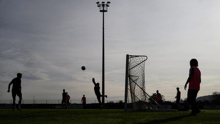 Une séance d'entraînement du GOAL FC, le 28 septembre 2023. (JEFF PACHOUD / AFP)