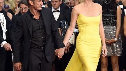 Sean Penn et Charlize Theron sur le tapis rouge ce jeudi
 (VALERY HACHE / AFP)