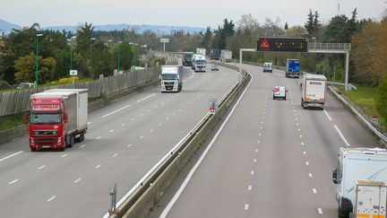 Trucks travel on the A7 motorway near Valence (Drôme), March 30, 2020. (NICOLAS GUYONNET / HANS LUCAS / AFP)