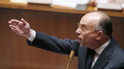 Le ministre d&eacute;l&eacute;gu&eacute; au Budget, Bernard Cazeneuve, le 15 mai 2013 &agrave; l'Assembl&eacute;e nationale.&nbsp; (PATRICK KOVARIK / AFP)