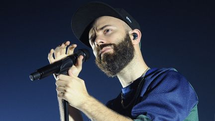 Le musicien Yoann Lemoine, alias Woodkid, sur scène à Berlin (Allemagne) le 11 novembre 2013 (BRITTA PEDERSEN / DPA)