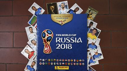 L'album Panini de la Coupe du monde 2018. (MARCO BERTORELLO / AFP)