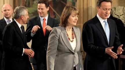 David Cameron, le Premier ministre britannique et  sa feme, se rendantr au discours du trône à Londres, le 25/15/10 (AFP/Chris Jackson)