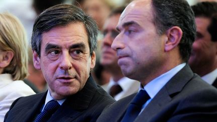 Fran&ccedil;ois Fillon et Jean-Fran&ccedil;ois Cop&eacute;, lors d'un meeting de Nicolas Sarkozy, le 3 mai 2012 &agrave; Bordeaux. (JEAN-PIERRE MULLER / AFP)