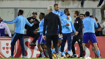 Evra vient de donner un coup de pied à un supporteur de l'OM (MIGUEL RIOPA / AFP)