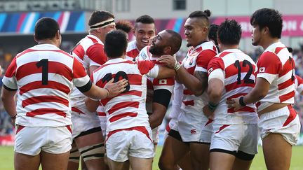 Les Japonais ont battu l'Afrique du Sud, lors de leur premier match de la Coupe du monde, le samedi 19 septembre 2015 &agrave; Brighton (Royaume-Uni). (JUSTIN TALLIS / AFP)