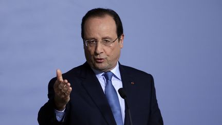 Fran&ccedil;ois Hollande, lors d'une conf&eacute;rence de presse &agrave; Riyad (Arabie Saoudite), le 29 d&eacute;cembre 2013. (KENZO TRIBOUILLARD / AFP)