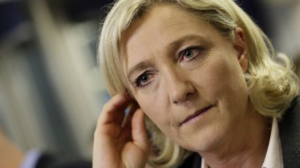 La pr&eacute;sidente du FN Marine Le&nbsp;Pen, le 30 mars 2014, au si&egrave;ge de son parti, &agrave; Nanterre (Hauts-de-Seine). (KENZO TRIBOUILLARD / AFP)