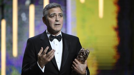 L'acteur américain George Clooney reçoit un César d'honneur, le 24 février 2017, à Paris. (BERTRAND GUAY / AFP)