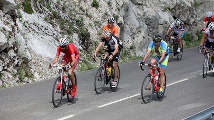 Près de 13 000 cyclistes amateurs ont précédé le peloton du Tour de France, le 8 juillet 2018, entre Annecy et Le Grand-Bornand (Haute-Savoie). (MAXPPP)