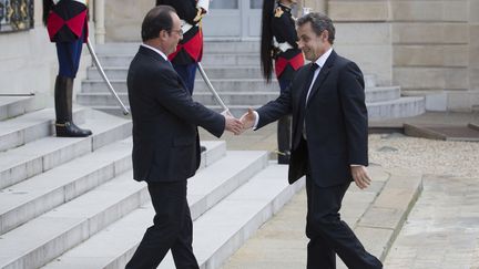 &nbsp; (François Hollande et Nicolas Sarkozy sur le perron de l'Elysée en juin 2016 © AFP)