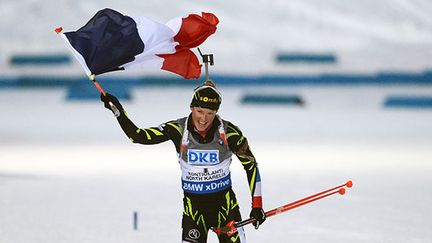 Marie Dorin-Habert a remporté l'épreuve de poursuite aux championnats du monde de biathlon dimanche 8 mars en Finlande. (RALF HIRSCHBERGER / DPA)