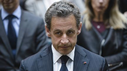 Nicolas Sarkozy, le 28 f&eacute;vrier 2014 &agrave; Berlin. (CLEMENS BILAN / AFP)