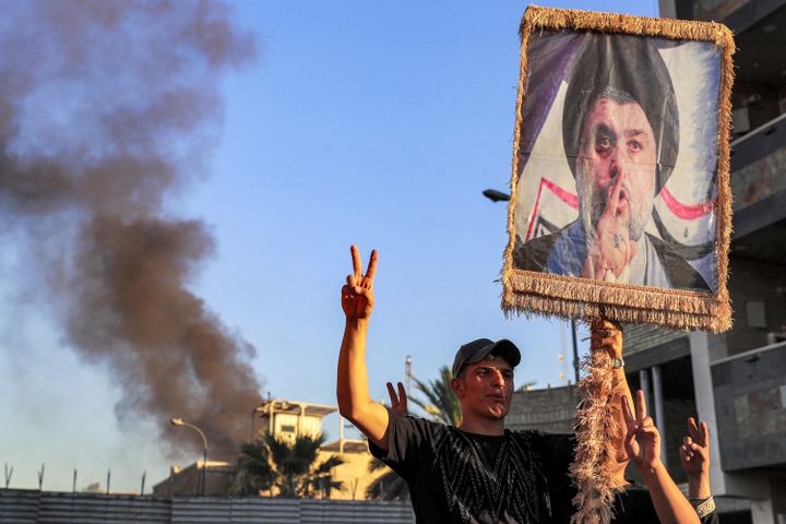 Smoke rises from a Swedish embassy building in Baghdad as supporters of Shia leader Moqtada Sadr demonstrate against allowing a desecration of the Quran on July 20, 2023. (AHMAD AL-RUBAYE / AFP)