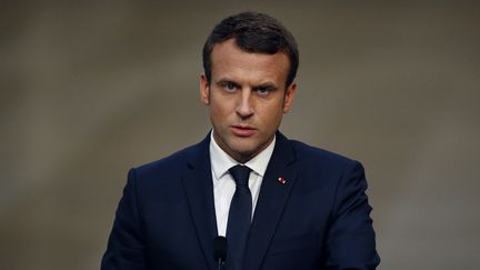 Emmanuel Macron, à Versailles (Yvelines), le 29 mai 2017, lors d'une conférence de presse commune avec Vladimir Poutine. (GEOFFROY VAN DER HASSELT / AFP)