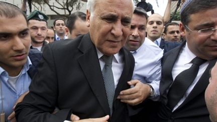 L'ex-président israélien, Moshe Katzav, à la sortie de la Cour de Justice de Tel-Aviv le 30 décembre 2012 (AFP Jack Guez)